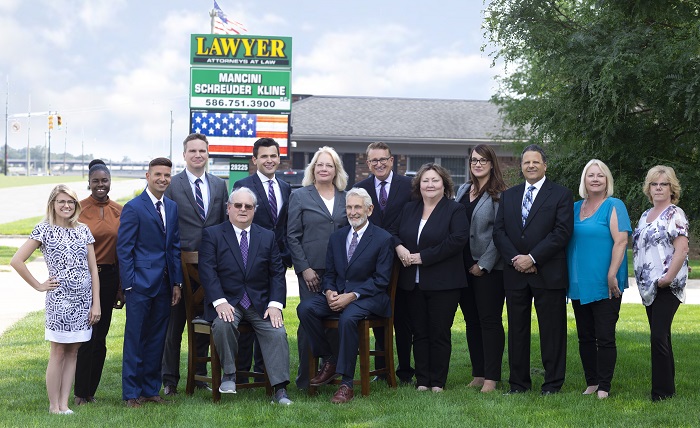 Group photo of members of Mancini Schreuder Kline PC